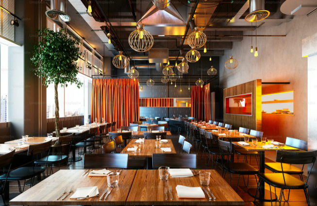 Restaurant owner reviewing QR menu analytics on a tablet